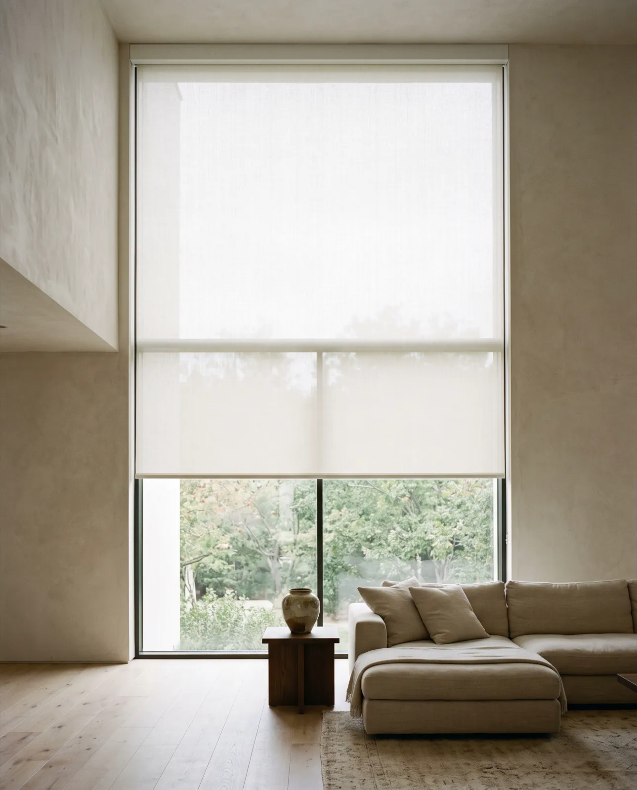 A finished installation: a shade fitted to a two-storey window